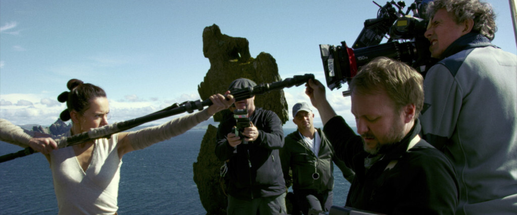 Star Wars: The Last Jedi..L to R: Daisy Ridley (Rey) on the Skellig Island (Ach-to) set with Director/Writer Rian Johnson..Photo: Lucasfilm Ltd...©2017 Lucasfilm Ltd. All Rights Reserved