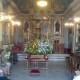 La imagen del Cristo de la Salude en su capilla antes de partir en romeria hace unos minutos/@arturpart