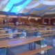 Interior de la carpa de MasGalicia con las mesas y papeleras/vlcciudad