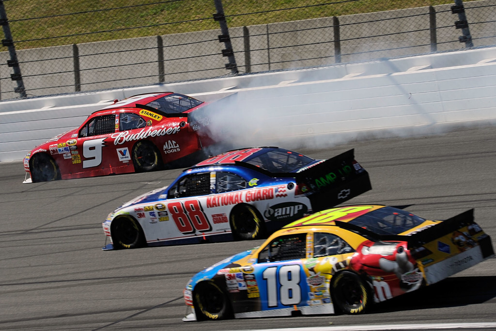 KANSAS CITY, KS - OCTOBER 03: Kasey Kahne, driver of the #9 Budweiser Ford, hits the wall during the NASCAR Sprint Cup Series Price Chopper 400 on October 3, 2010 in Kansas City, Kansas. (Photo by John Harrelson/Getty Images)